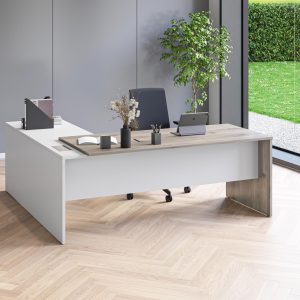 executive desk with light wood top and side, with white modesty panel and side extension